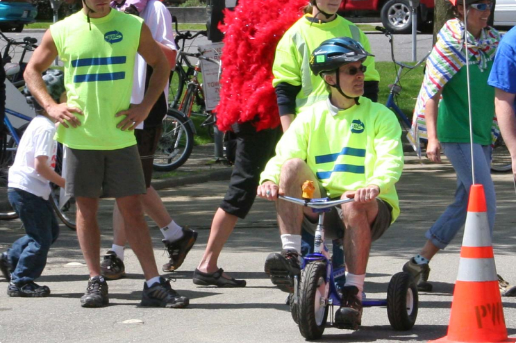 Man riding a tricycle